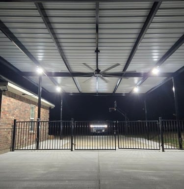 Black Fence with Fan Above