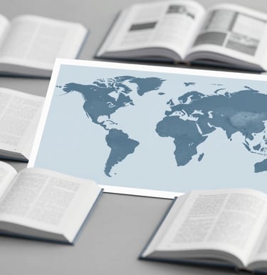 A professional flat-lay photograph of various open textbooks and a global map, signifying international distribution. Features clean lines and a professional aesthetic using #3C5A6C and #EBF2F6 tones.