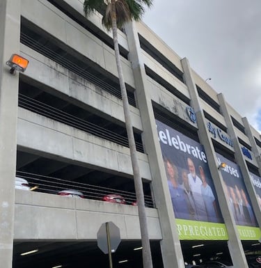 exterior building concrete pressure cleaning before image by psi power washing 