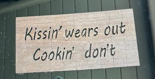 "Kissin' wears out, cookin' don't" jigsaw puzzles
