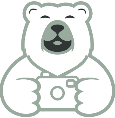 Logo de Papa Ours Photo – un ours souriant tenant un appareil photo