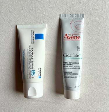La Roche-Posay Cicaplast Balm B5 and Avène Cicalfate+ repair creams on white background 