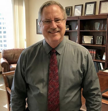 M&A Advisor Stan Cortland, expert in contractor business exits for the Western U.S., professional headshot.