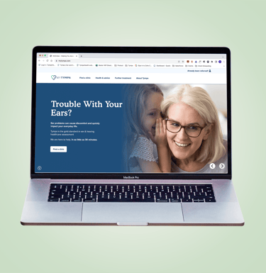 Modern laptop showing website and layout