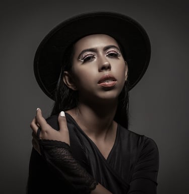 a woman with a hat and a black hat