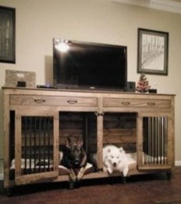 Rustic wooden double dog crate furniture serving as an indoor kennel and TV stand for two dogs.