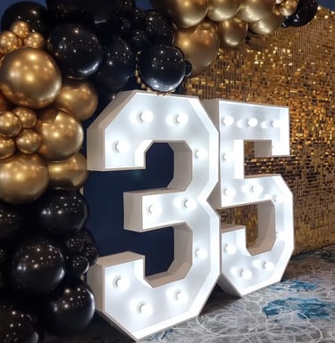 Gold Shimmer Wall featured at a 35Th Anniversary in Wynnum, Brisbane - party hire by SweetAz Co.