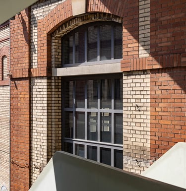 a building with a clock towering over a building