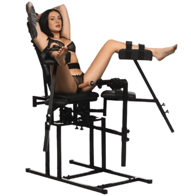 a woman in black lingerie on a sex chair that holds her legs apart and there is a dildo in front