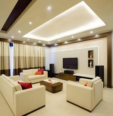 a living room with a couch Celling Curtain Sofa set center table and a television