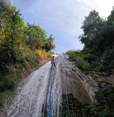 canyoning down a waterfall