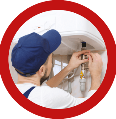 a plumber in a kitchen with a plumber