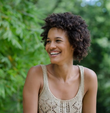 Beautiful woman with afro hairstyle smiling