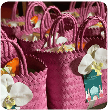 Tas anyaman plastik warna pink sebagai souvenir Lebaran handmade Craftvitas Indonesia