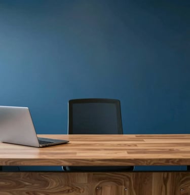 A sleek, professional North American office interior. A Medium Blue wall serves as a backdrop to a minimalist wooden desk. The lighting is soft and natural, creating a sophisticated and trustworthy atmosphere.