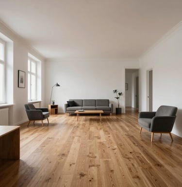 A wide shot of a modern, open-plan interior of a renovated apartment in Hamburg with warm oak floors, white walls, and elegant minimalist furniture, Central European style.