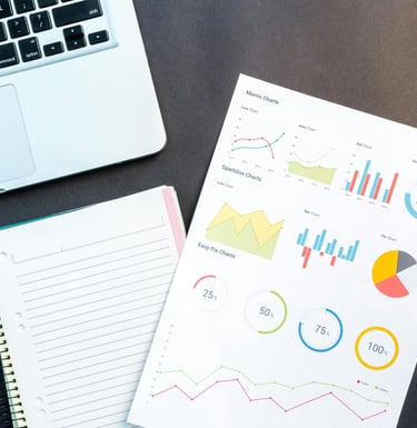 Laptop and documents on a desk