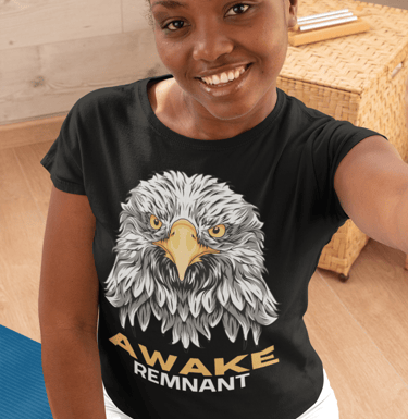 Smiling woman in black t-shirt with fierce eagle face and "Awake Remnant" text. God's last day Army!
