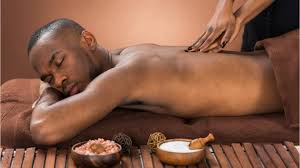 Guy getting a body to body massage