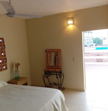 Bedroom door leads to private, expansive terrace