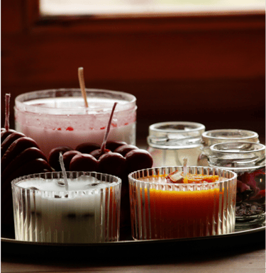 a tray with aromatic  candles for bedroom and valentine's day