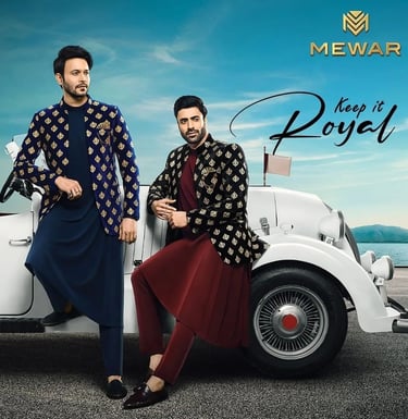 a man and woman in traditional indian attire, sitting on a car