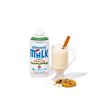 a glass of milk with a cinnamon cinnamon cinnamon milkshack