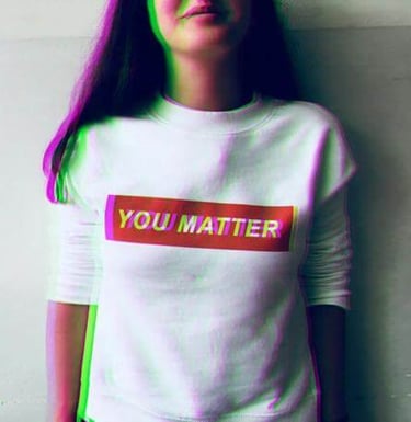 Person wearing a shirt that reads ‘You Matter,’ representing dignity, value, and encouragement.