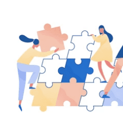 people are standing around a puzzle piece of puzzle pieces