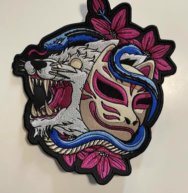 a patchwork embroidered on a white background