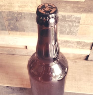 Première bouteille de bière Tolas Helann