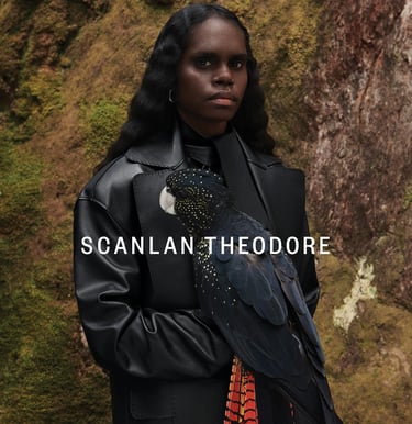 Scanlan Theodore advertising photo featuring Horus the Red Tail Black Cockatoo