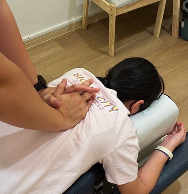 Chiropractic spinal adjustment therapy for back pain at Sinisana Chiropractic