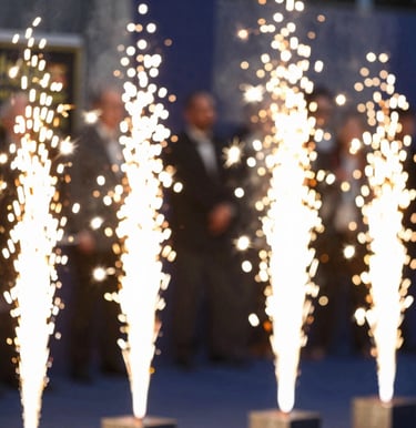 A premium red carpet event photo, bright flashbulbs in the background creating beautiful champagne sparkles, capturing a vibrant, celebratory Hollywood premiere. Warm gold and deep midnight blue colors. North American / US venue.
