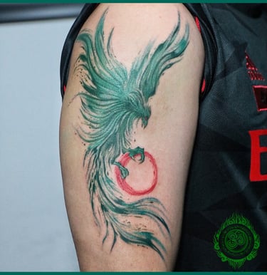 Unique turquoise phoenix tattoo design by MaxDuong Tattoo