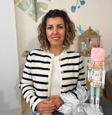 a woman in a striped sweater and a nutcraw