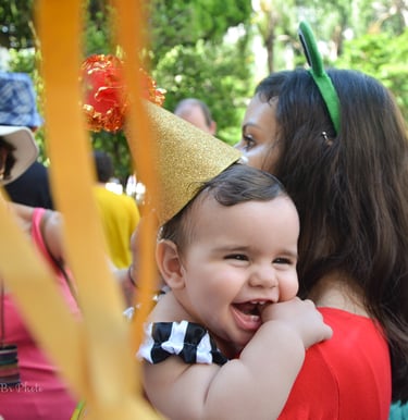 Mother and baby at party