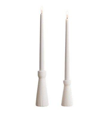 Set of white candle holders for minimalist dining room decoration