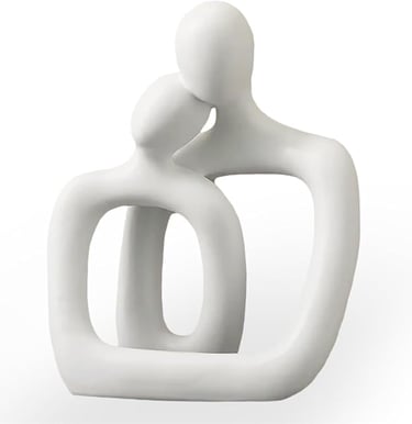 Minimalist lovers' statue as a meaningful bedroom statement decor piece.