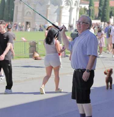 a man in a white shirt and black shorts