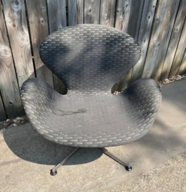 swan chair before with faded and damaged fabric