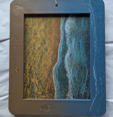 Refurbished framed chalkboard. New chalk art of beach and surf with framed painted with shells and 3D water surf.