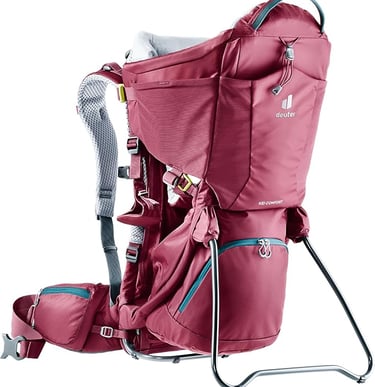 a baby carrier with a baby in a pink and blue backpack