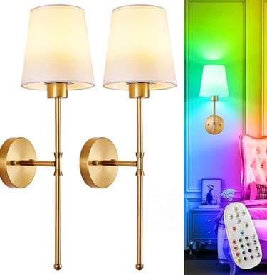 Set of two gold wall sconces with white fabric shades and color-changing RGB smart bulbs.
