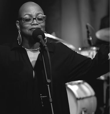 Tiya Adé, vocalizing a classic tune.