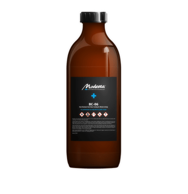 a bottle of liquid in a glass bottle