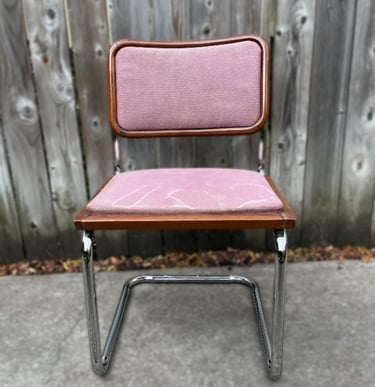 Vintage mid-century modern pink cantilever chair before reupholstery