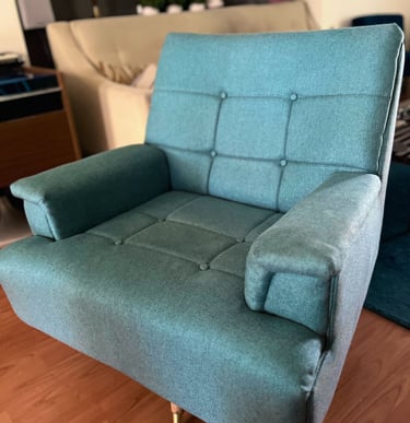 reupholstered blue swivel mcm boxy chair