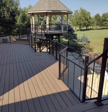 Outdoor composite deck by professional deck builder in [Columbus, Ohio]