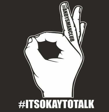 a person holding a sign that says it's okay to talk